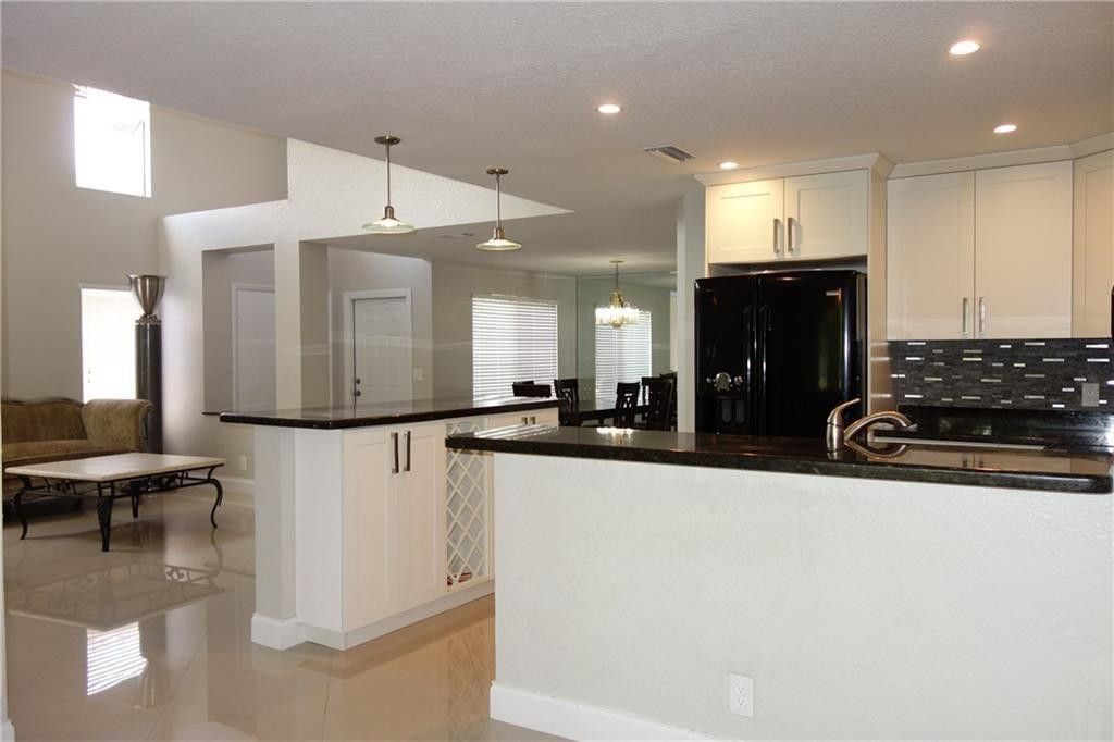 Photo of 2060 NW 34th Avenue, Coconut Creek, FL 33066 (MLS # F10550273)