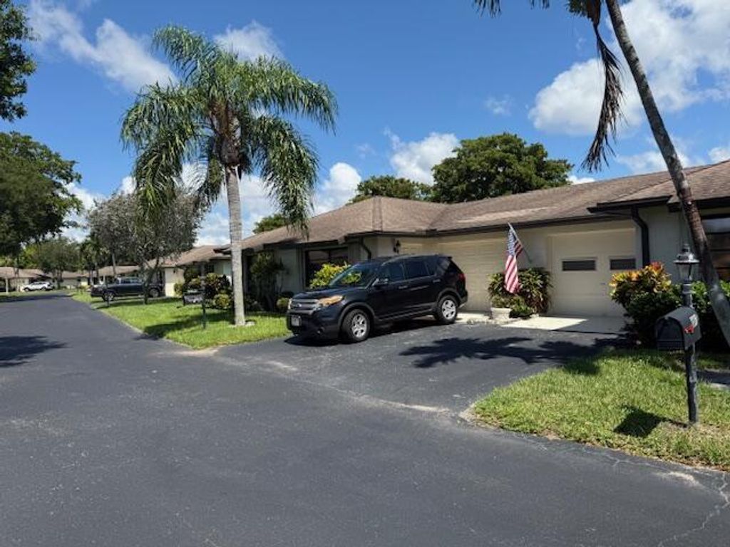 Photo of 4861 Equestrian Road #A, Boynton Beach, FL 33436 (MLS # R11108053)
