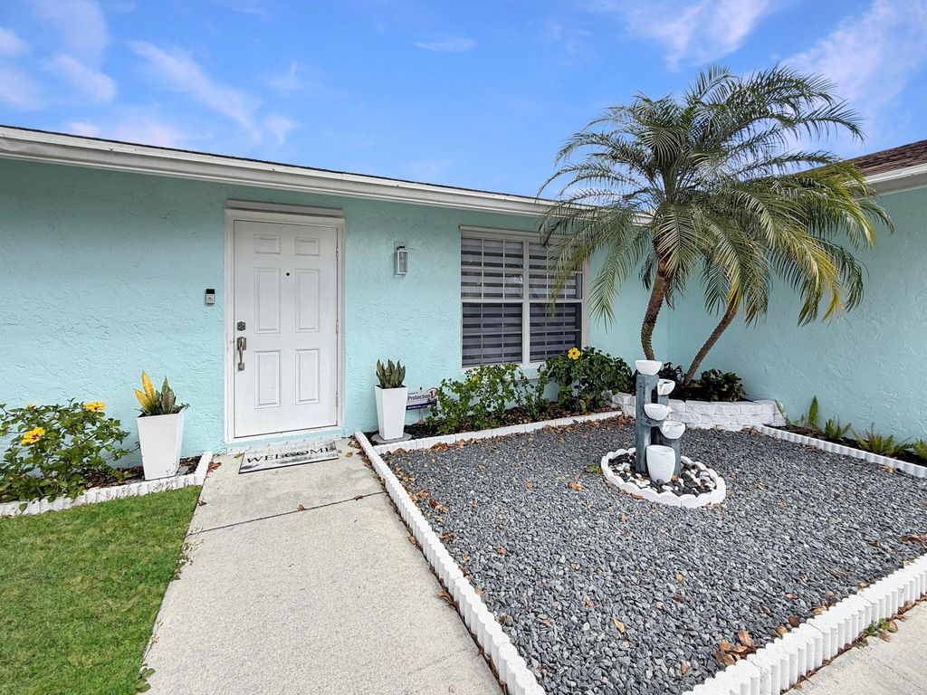 Photo of 110 Bobwhite Road, Royal Palm Beach, FL 33411 (MLS # R11168980)