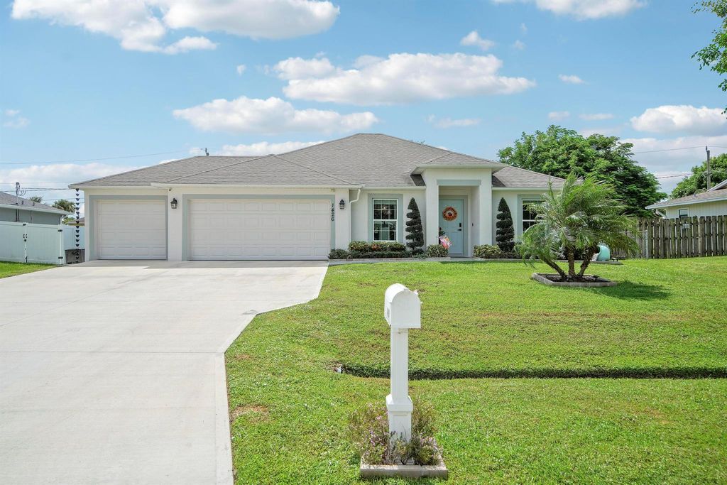 Photo of 1426 SW Devera Avenue, Port Saint Lucie, FL 34953 (MLS # R11126696)