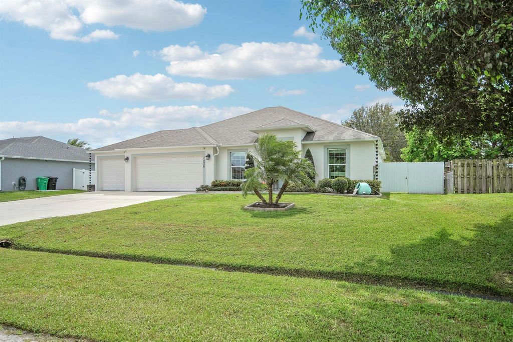 Photo of 1426 SW Devera Avenue, Port Saint Lucie, FL 34953 (MLS # R11126696)