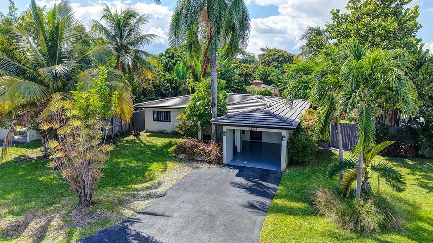 Bright modern ranch style home in desirable Oakland Park.  Nicely landscaped large corner lot. 3 bed 2 bath home is fully updated with an open concept kitchen/living/dining area, glass enclosure walk-in showers & floating vanities in bathrooms, matching glossy white custom cabinets & quartz counter tops in kitchen and baths, and all white porcelain tile flooring throughout entire home to give it a seamlessly finished appeal.  California closet systems. Fully fenced private backyard, large 15x28 salt chlorination pool 6' deep, new pool motor, automatic irrigation system 2021, outdoor shower.  Concrete tile charcoal color roof 2021, GE electric panel 2018, Rheem instant hot water heater 2023, HVAC 2018 regularly maintained serviced, all hurricane impact windows/doors,  PVC and copper pipes.