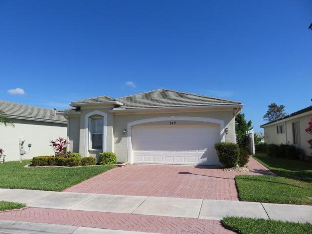 Photo of 849 SW Rocky Bayou Terrace, Port Saint Lucie, FL 34986 (MLS # R10706615)