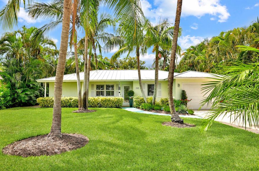ATTENTION ALL BOATERS! NO FIXED BRIDGES - OCEAN ACCESS - MINUTES TO THE INLET! What an ABSOLUTE GEM! Beautifully maintained 2 /2/1  Key West style home in the Charming Boating Community of Rocky Point Estates. All Impact Windows in the Home. 2022 AC! 2023 new carpets! Range and Microwave is 2022. Newer hot water heater 2018. Roof is 2016! Vaulted Ceiling in Living Area. Plantation Shutters on Windows. Walk-in Closet in Master Bedroom. as well as  New shower doors and ceiling fan in Master Suite!  LUSH Landscaping in Front and Backyard with Fence. Minutes to downtown Stuart where you can enjoy shopping and dining and a host of activities and festivals. Enjoy launching your boat from the ramp of the private marina. Best buy near the Ocean with a LOW HOA fee! Large Driveway -Bring your toys!