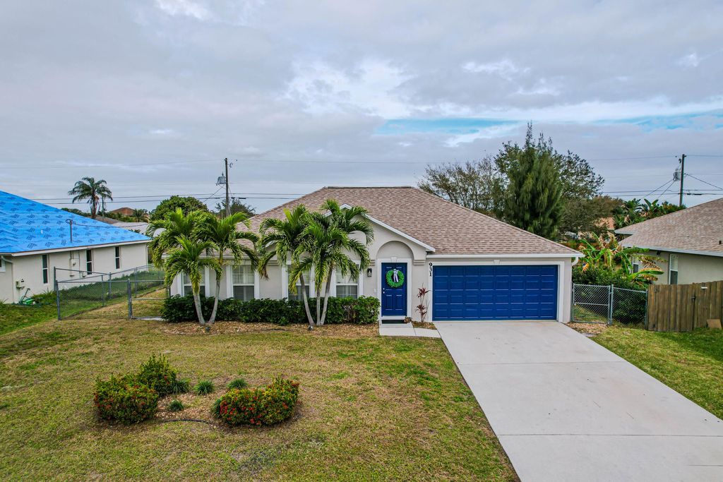 Photo of 931 SW Haas Avenue, Port Saint Lucie, FL 34953 (MLS # R10956398)