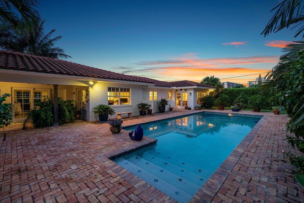Photo of 200 Cascade Lane, Palm Beach Shores, FL 33404 (MLS # R11061150)