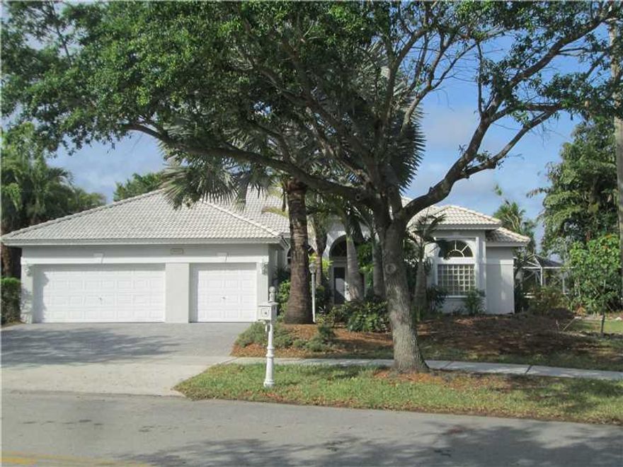 Lovely 4 bedroom 3 bath, pool home on beautiful lake. Watch the sunsets from screened patio. Triple split bedrooms. Large family room. Top schools. Near shopping and major highways.