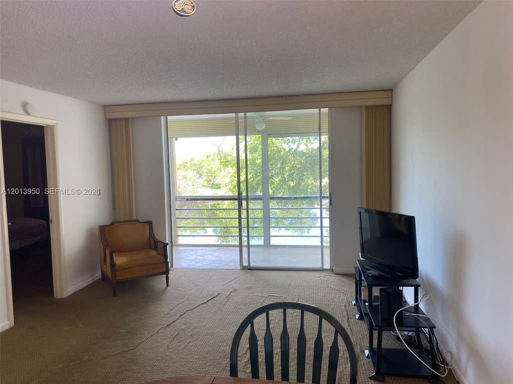 Photo of 9370 Sunrise Lakes Boulevard #209, Sunrise, FL 33322 (MLS # A12013950)