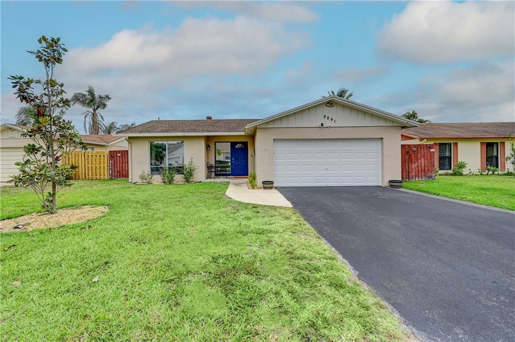 Photo of 9841 NW 24th St, Coral Springs, FL 33065 (MLS # F10373576)