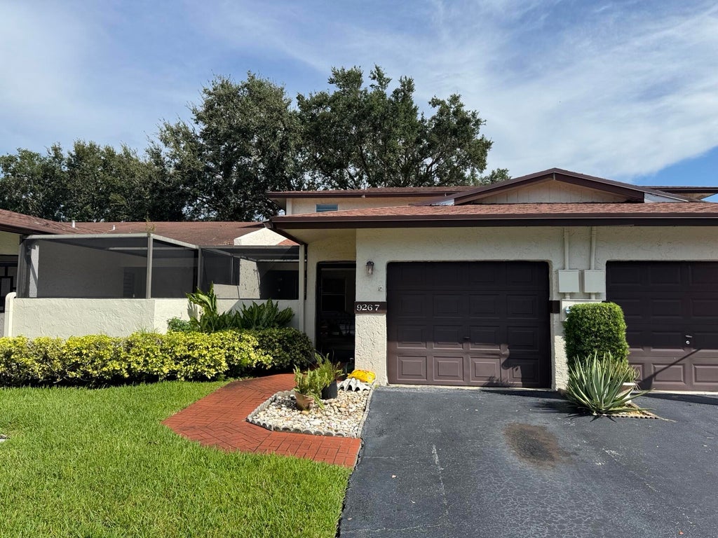 Photo of 9267 NW 61st Street, Tamarac, FL 33321 (MLS # B26080599)