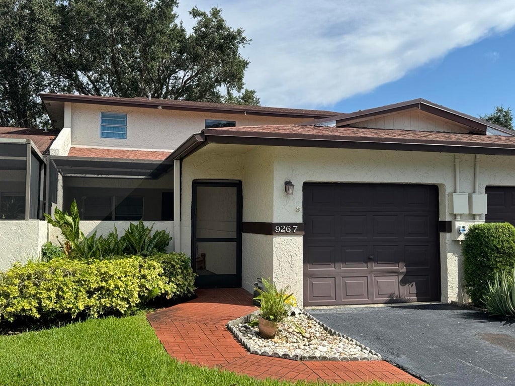 Photo of 9267 NW 61st Street, Tamarac, FL 33321 (MLS # B26080599)