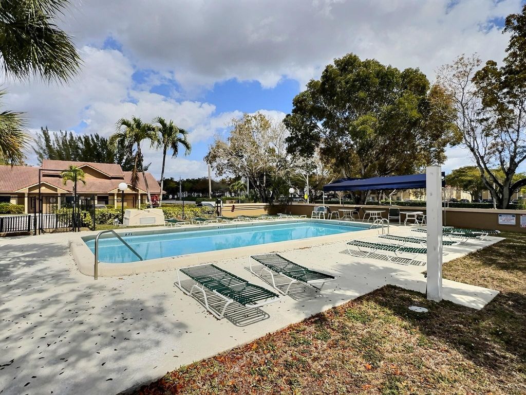 Photo of 2652 Riverside Drive, Coral Springs, FL 33065 (MLS # F10554145)