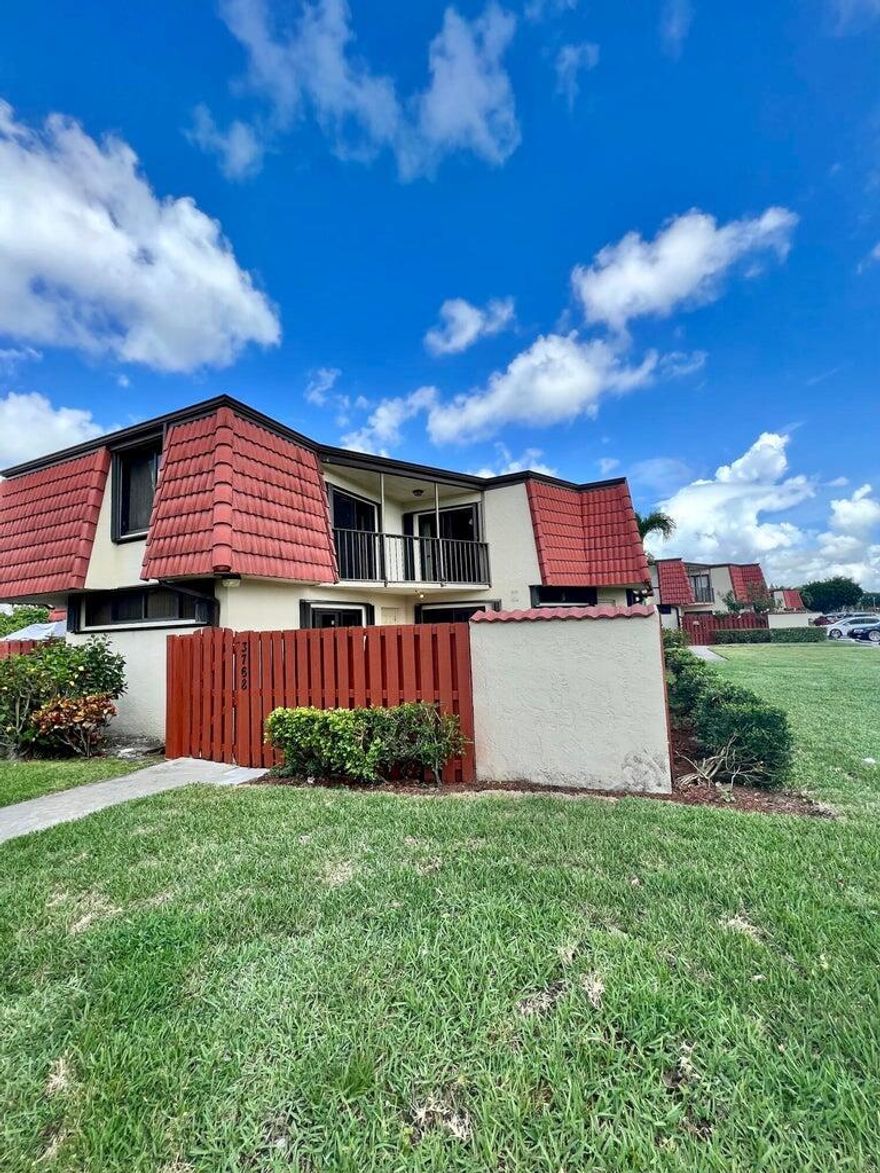 Bright and Beautiful Townhouse! Both bedrooms have a full bath! Half bath downstairs! Freshly painted, new luxury laminate flooring in hallway + master bedroom, IMPACT WINDOWS, BRAND NEW BLINDS. READY TO RENT!