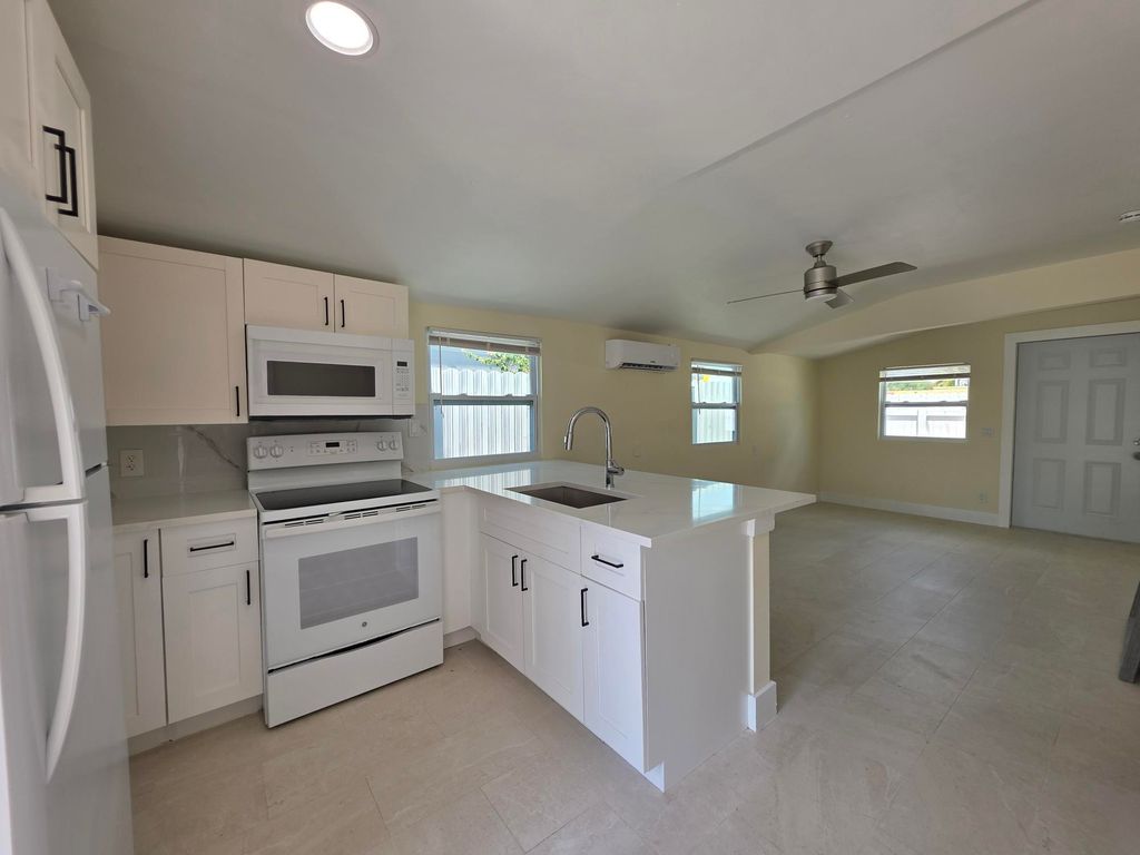 Photo of 312 N H Street #B, Lake Worth Beach, FL 33460 (MLS # B26023843)