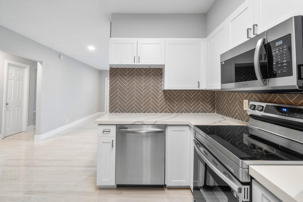 Just blocks from Downtown Boca Raton and the bustling Mizner Park. Prepare to be amazed by this completely remodeled gem! With its modern design finishes, this property exudes elegance and sophistication. Enjoy the abundance of natural light that fills the space, creating a bright and inviting atmosphere. The fully fenced-in yard adds privacy and a safe haven for outdoor activities. Located just a quick bike ride away from the beach and in close proximity to Florida Atlantic University, this home offers the perfect blend of convenience and luxury. Don't miss out on the opportunity to call this stunning Boca Raton residence your own. Schedule a private showing and experience the magic firsthand!