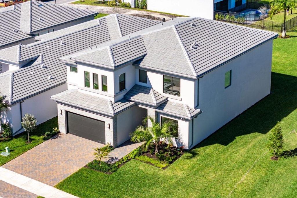 Photo of 8227 Essex Country Club Drive, Boca Raton, FL 33434 (MLS # R11063806)