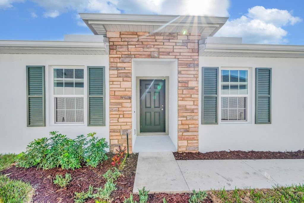 Photo of 9641 SW Libertas Way, Port Saint Lucie, FL 34987 (MLS # F10484108)