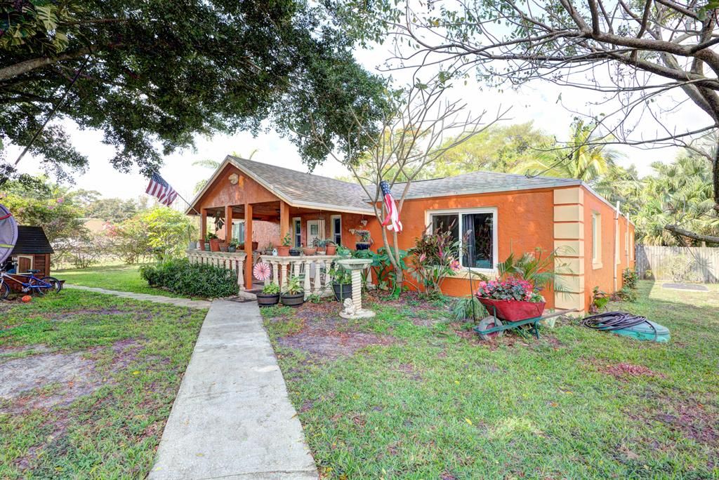 Photo of 4391 Whispering Pines Road, West Palm Beach, FL 33406 (MLS # R10697663)
