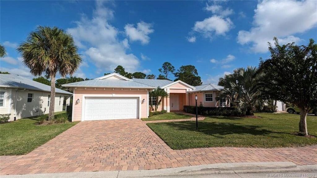 Photo of 155 SW Cocoloba Way, Stuart, FL 34997 (MLS # R10900156)