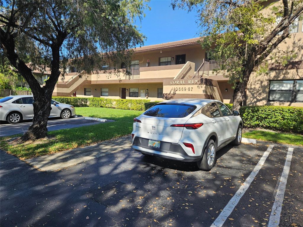 Photo of 10571 Royal Palm Boulevard #10571, Coral Springs, FL 33065 (MLS # F10542548)