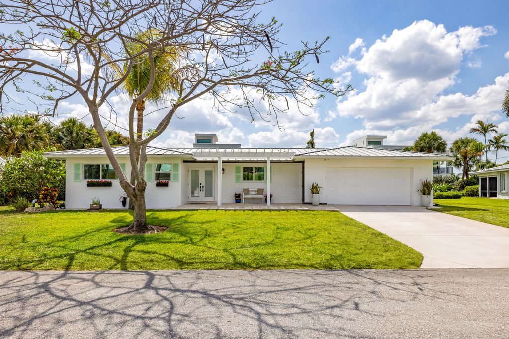 Photo of 461 Apollo Drive, Juno Beach, FL 33408 (MLS # B26029892)