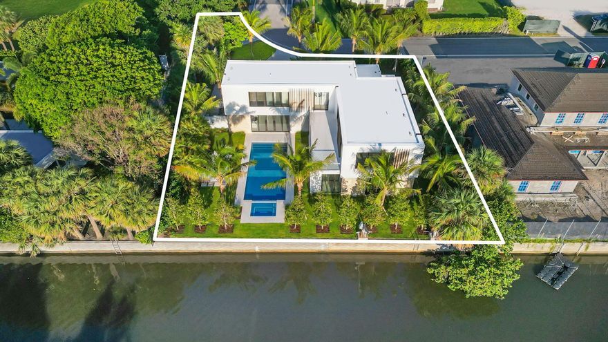 Brand New Waterfront home on sought after Ibis Isle. State of the Art-Luxurious New Construction built by Courchene Development. This 4bedroom/4.1Bath home sits directly on the Intracoastal providing breathtaking waterfront vistas for miles. Recently completed, and move in ready, this spectacular home has all the bells and whistles! Equipped with a Crestron Smart Home System. Gourmet kitchen and appliances to satisfy the most discerning chef. Custom cabinetry and built-ins, and elegant book matched marble on the fireplace and in bathrooms. Soaring High Impact floor to ceiling windows & doors throughout, lushly landscaped backyard featuring a large heated lap pool with spa, spacious covered loggia for dining al fresco and so much more making this the perfect home for indoor/outdoor living.