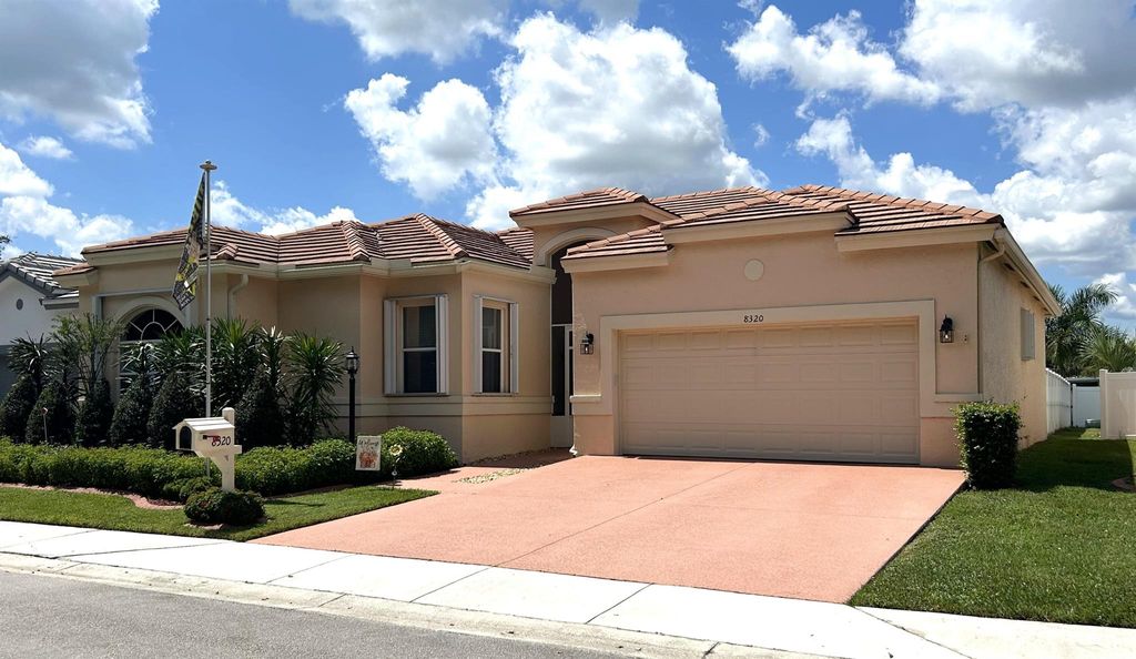 Photo of 8320 Lake Cypress Road, Lake Worth, FL 33467 (MLS # R10919668)