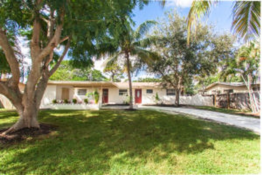 **Beautifully Renovated** 3 bedroom, 2 bath home with a rustic charm. NEW ROOF, A/C air handler and compressor!! Fully remodeled kitchen featuring white custom cabinetry, granite countertops and stainless steel appliances. Exposed wood beamed ceilings and a brick lined fireplace give this home a country feel. Clay tile throughout living area, new wood laminate floors in bedrooms. Updated bathrooms with new vanities and fixtures. Tons of natural light! Enjoy your free time relaxing in the fully enclosed patio overlooking the expansive fenced backyard. Plenty of room for a pool and entertaining!