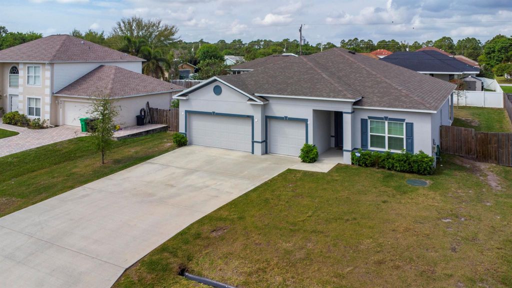 Photo of 4002 SW Bamberg Street, Port Saint Lucie, FL 34953 (MLS # R10970166)