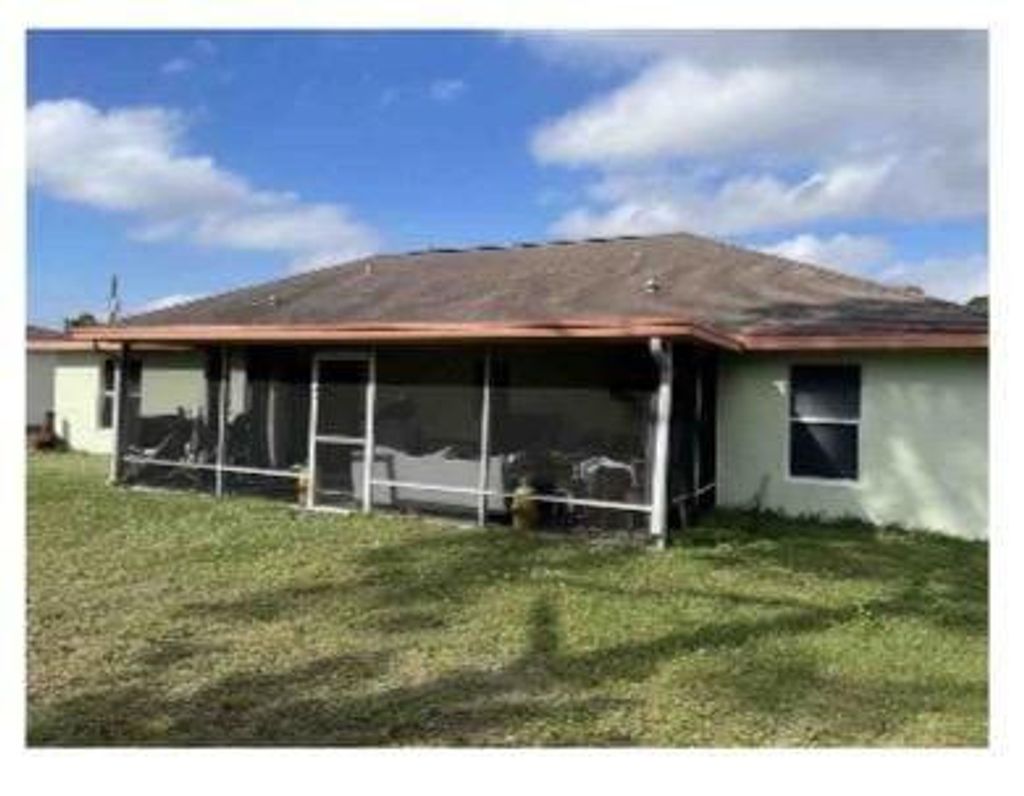 Photo of 1318 SW Kapok Avenue, Port Saint Lucie, FL 34953 (MLS # F10446934)