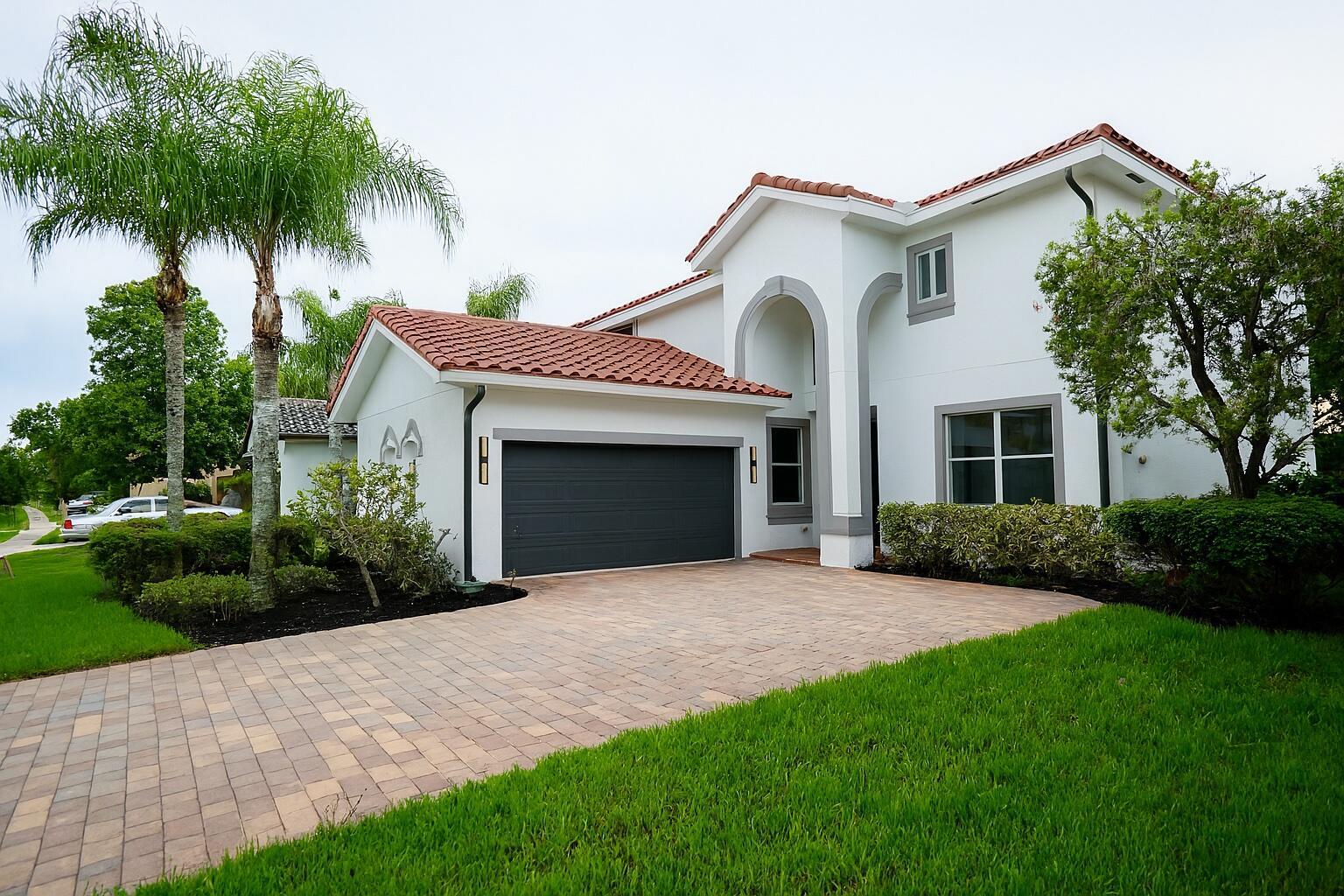 Stunning, fully renovated 5 bedroom home in Cobblestone Creek - High end upgrades including a modern kitchen with quartz countertops, designer bathrooms, upgraded flooring, modern fixtures, and fresh paint throughout. A permitted 5th bedroom is currently in process, making this one of the most versatile homes at this price point. This is the only move-in-ready, turnkey home on the market in Cobblestone Creek. Enjoy spacious living areas, a large backyard and resort-style amenities. Zoned for top-rated schools, Sunset Palms Elementary and West Boynton Middle School. Don't miss this rare opportunity!