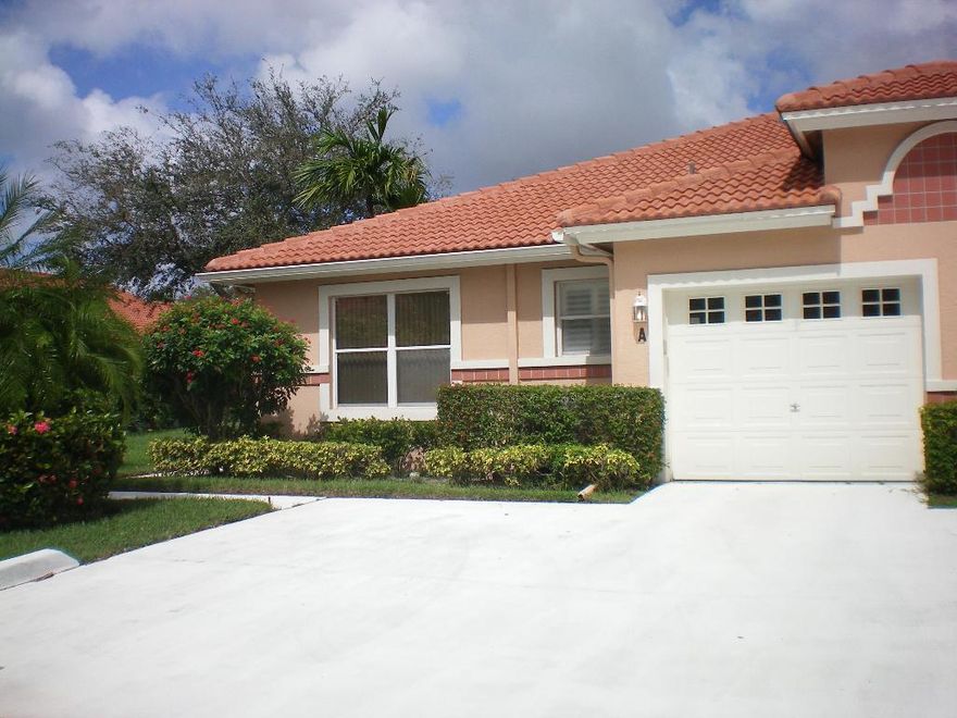 Beautifully updated Largest Villa in Palm Isles I. Two Bedrooms with open Den. New flooring in Bedrooms and Den. New Kitchen with Granite Countertops and Cabinets. Very immaculate home, freshly painted, move in ready. Great location near satellite pool. End Unit makes this home very light and bright. Laundry Room between kitchen and garage. Double driveway with one car garage. Must be seen.  All located in the Community of Palm Isles with it's fabulous Clubhouse. Over 50,000 sq. ft. of amenities including Indoor and Outdoor Pools, 600 Seat Theatre of Performing Arts, 8 Har-Tru Tennis Courts, Mens and Womens spa facilities including exercise, lots of card rooms, ceramics, billiards, Even a Café for Breakfast and Lunch. This is the place to be!