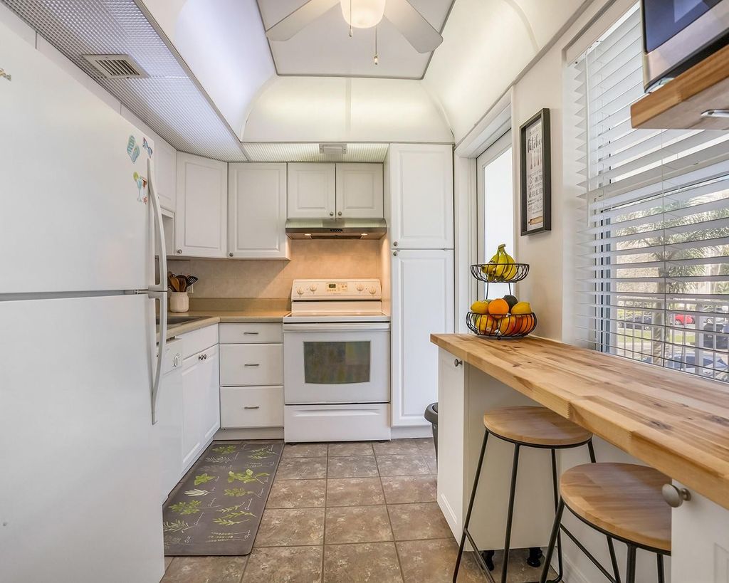 Photo of 2671 S Course Drive #203, Pompano Beach, FL 33069 (MLS # F10549360)