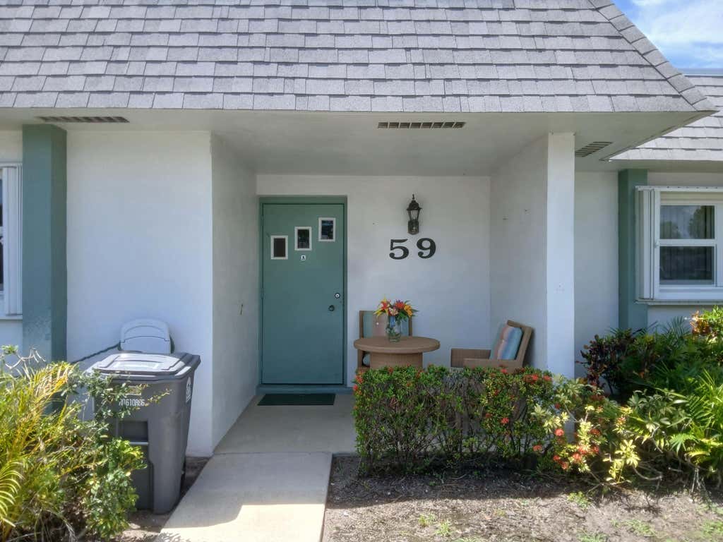 Photo of 2638 GATELY Drive E #59, West Palm Beach, FL 33415 (MLS # B26056671)