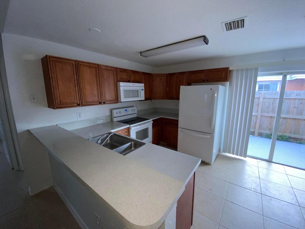 Photo of 618 NE 1st Street #B, Boynton Beach, FL 33435 (MLS # B26023709)