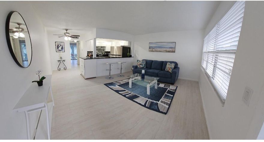 GORGEOUS , WATER VIEW , REMODELED  1/ 1 condo on the  first floor.  Beautiful porcelain  tile throughout the entire condo. Newer AC  / 2018/ and water heather /2021/  CENTRAL AIR , New el. panel .  Enjoy your morning coffee with a beautiful water view in the enclosed patio.  Many  upgrades including the   hot tub massager/whirlpool, new open kitchen, beautiful backsplash and  appliances . Must see!  The main clubhouse has indoor and outdoor pool, restaurant, theater, clubs, classes, billiards, tennis, pickleball, volleyball, ping pong, shuffle board, fitness center, bike trails and more. Close to Beaches, Entertainment, Dining, Shopping .Walking distance to the club house . You can rent it Seasonal  after 1st year of ownership. Very motivated Seller; bring your offer today!