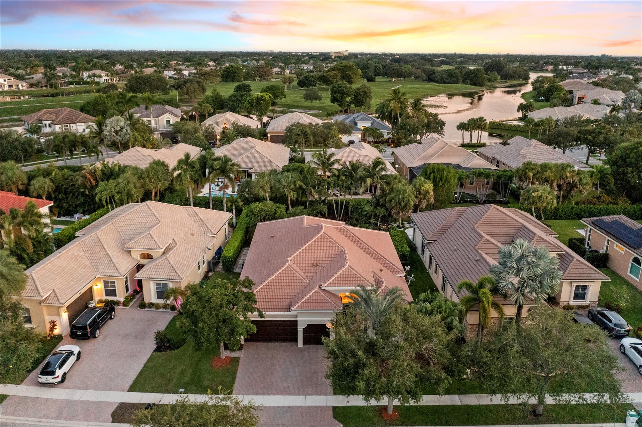 BEST DEAL IN ALL OF HERON BAY! BRAND NEW ROOF w/8 YEAR ASSIGNABLE WARRANTY! 4 Full Beds, 2.5 Baths, Pool Home w/3-Car Garage, Rare One-Story Heron Bay Dream Home In The Greens Community w/Spacious Screened-In & Partially Covered Patio, Tropical Oasis Backyard w/Swimming Pool & Water Features. Updated Kitchen w/Quartz Counters & Large Island, Breakfast Area Overlooking Back Patio, Volume Ceilings, Open Floor Plan, 4th Bed w/Built-In Oficce & Walk-In Closet, Tile Flooring Throughout Main Living Areas, Formal Dining Room Ideal For Family Gatherings, 2 A/C Units From 2020 & 2021, Lushly Ladnscaped & Private Fenced In-Yard Perfect For The Entire Family, Low HOA Dues Which Includes Resort-Style Amenities, 24-Hour Guard Gate, A+ Schools, Live The Heron Bay Lifestyle At An Affordable Price!