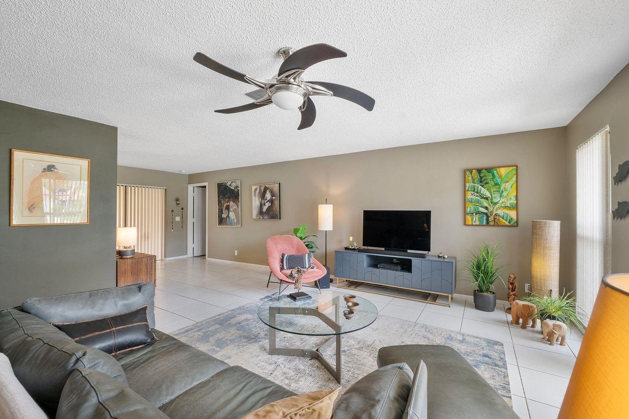 Impeccably maintained 2BD/2BA single-family home with versatile Flex Space, Split Floor Plan, 1-car Garage, and a spacious screened and tiled Patio. The interior features a soothing modern palette for a calm, inviting atmosphere.
Upgrades include full Storm Protection, 2017 A/C, 2025 Tankless Water Heater, 2015 Roof, Gutters, and more.
Located in the pet-friendly 55+ community of Coco Wood Lakes—ideally situated near the Turnpike, I-95, Beaches, Shopping, and Dining in Delray Beach. Residents enjoy a temperature-controlled Pool, Clubhouse, Fitness Center, Hot Tub, and an active calendar of events. Low HOA fee of just $195/month!