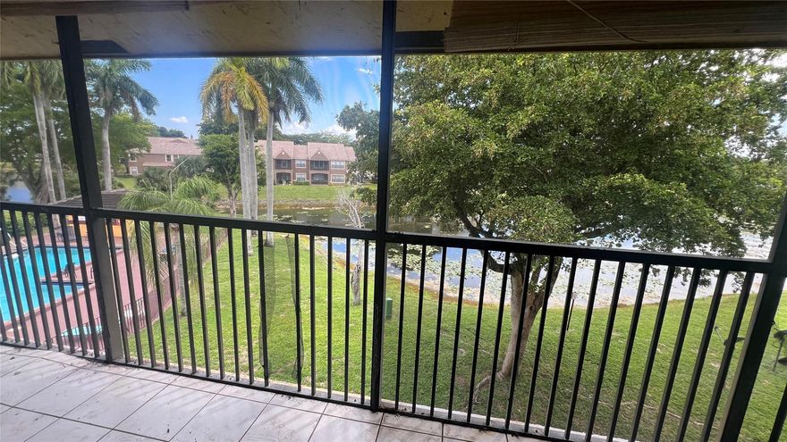 Welcome home to this spacious 3 bedroom, 2 bath unit centrally located to schools, hospital, shopping and dining.  The unit includes an in-home washer/dryer for added convenience. Tile floors throughout living areas and laminate floors in bedrooms. The updated kitchen features Granite countertops and Stainless-Steel appliances. Relax with your morning coffee on your private, screened-in balcony overlooking serene lake views and the community pool. Maintenance fee covers water, trash, and all amenities. Don't miss out on this great opportunity to live in a fantastic location perfect for families seeking a comfortable place to call home or investors looking to add a profitable property to their portfolio! This rare find is priced to sell! Call me today to schedule an appointment.