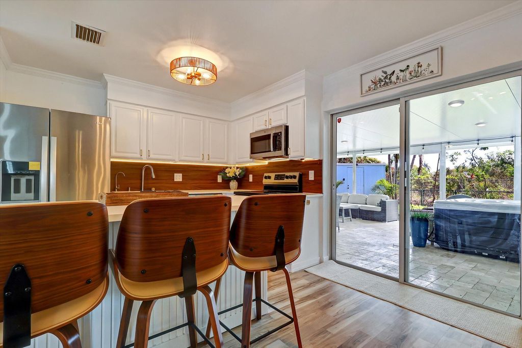 Photo of 3546 Betty Ann Court E, Palm Beach Gardens, FL 33403 (MLS # B26005674)