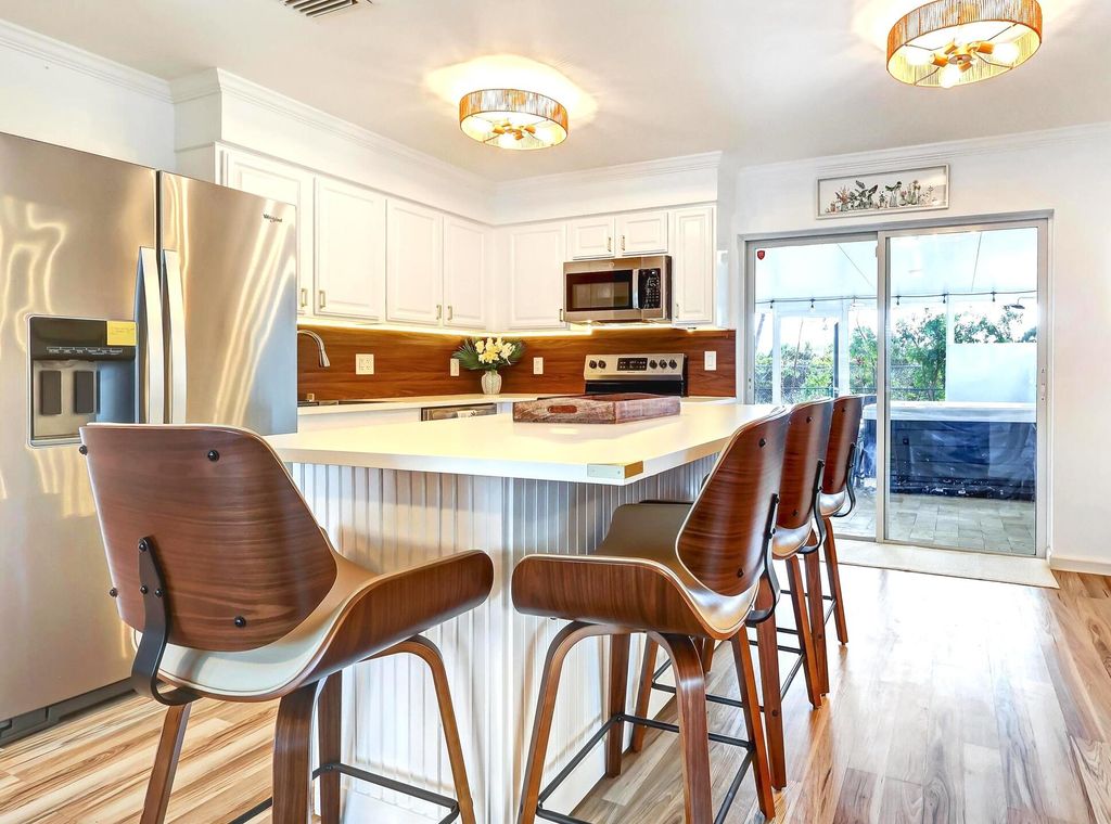 Photo of 3546 Betty Ann Court E, Palm Beach Gardens, FL 33403 (MLS # B26005674)