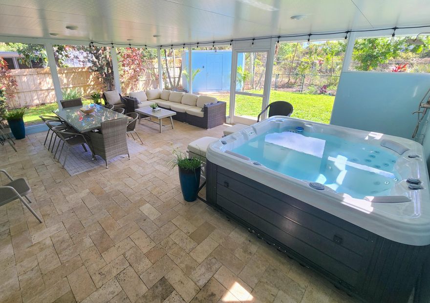 YOUR PRIVATE TURNKEY OASIS. Fully furnished, NO HOA, very quiet 3/2 offering approx. 1,200 sqft plus 430+ sqft screened outdoor living. Heated WELLIS SPA, large fenced backyard with no rear neighbors and rare PRIVACY. Bright, comfortable layout with seamless indoor outdoor flow, ideal for relaxing or entertaining. Move in ready or immediately rentable. Prime condition with 2024 AC and 2016 roof. Zoned for The Conservatory School at North Palm Beach, a sought after public magnet for gifted and music programs (K 8). Quiet yet convenient location minutes to beaches, shopping, dining and I 95. A must see to appreciate the setting, comfort and lifestyle. ALL furniture and essentials included, making the home move in or guest ready from day one. The screened porch with natural Travertine flooring extends daily living. Appliances updated between 2020 and 2025. Convenient access to parks, beaches, marina, dining, shopping and nearby schools and universities.