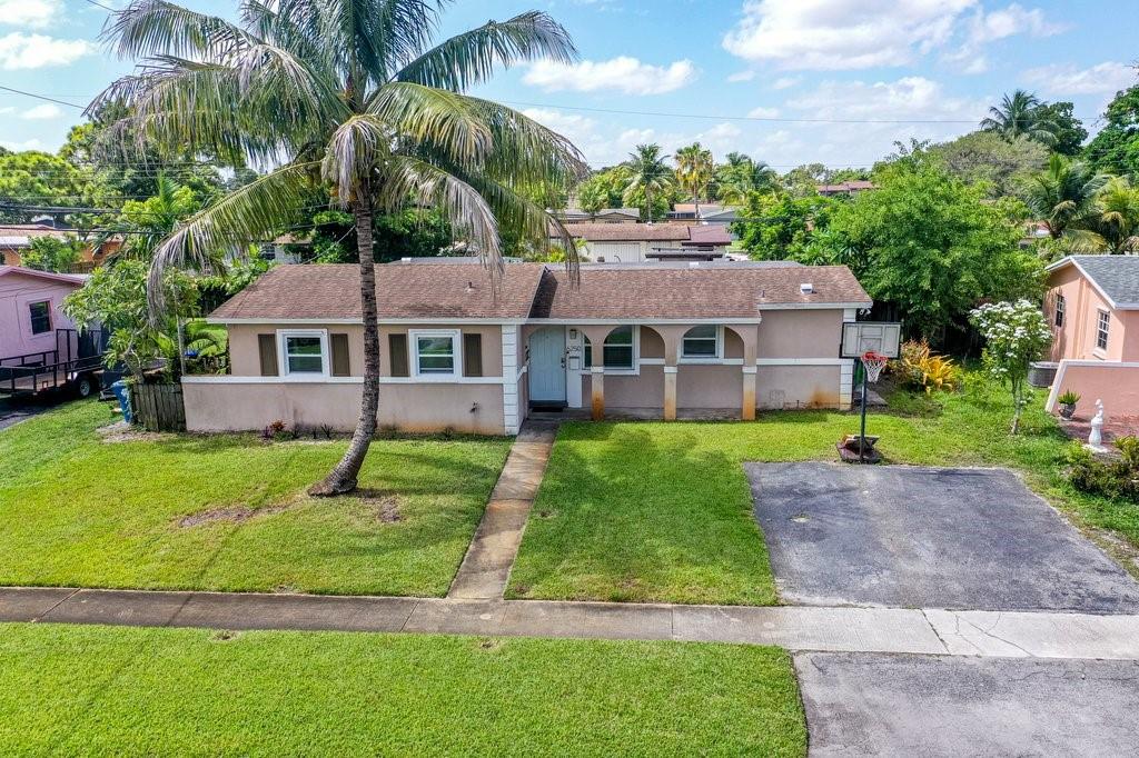 Welcome to 6250 NW 20th St in Sunrise! This spacious 4-bedroom, 3-bath single-family home offers endless possibilities to create your dream retreat. Enjoy a refreshing pool, an updated kitchen with stainless steel appliances and stunning Calacatta marble countertops, plus a newer roof for peace of mind. The master suite features an attached office, perfect for working from home. Ideally located near Sawgrass Mills Mall, Plantation Walk, top restaurants, and public transportation. Don’t miss the chance to make this versatile property your own!