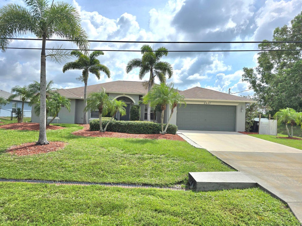 Photo of 5237 NW Milner Drive, Port Saint Lucie, FL 34983 (MLS # R11095774)