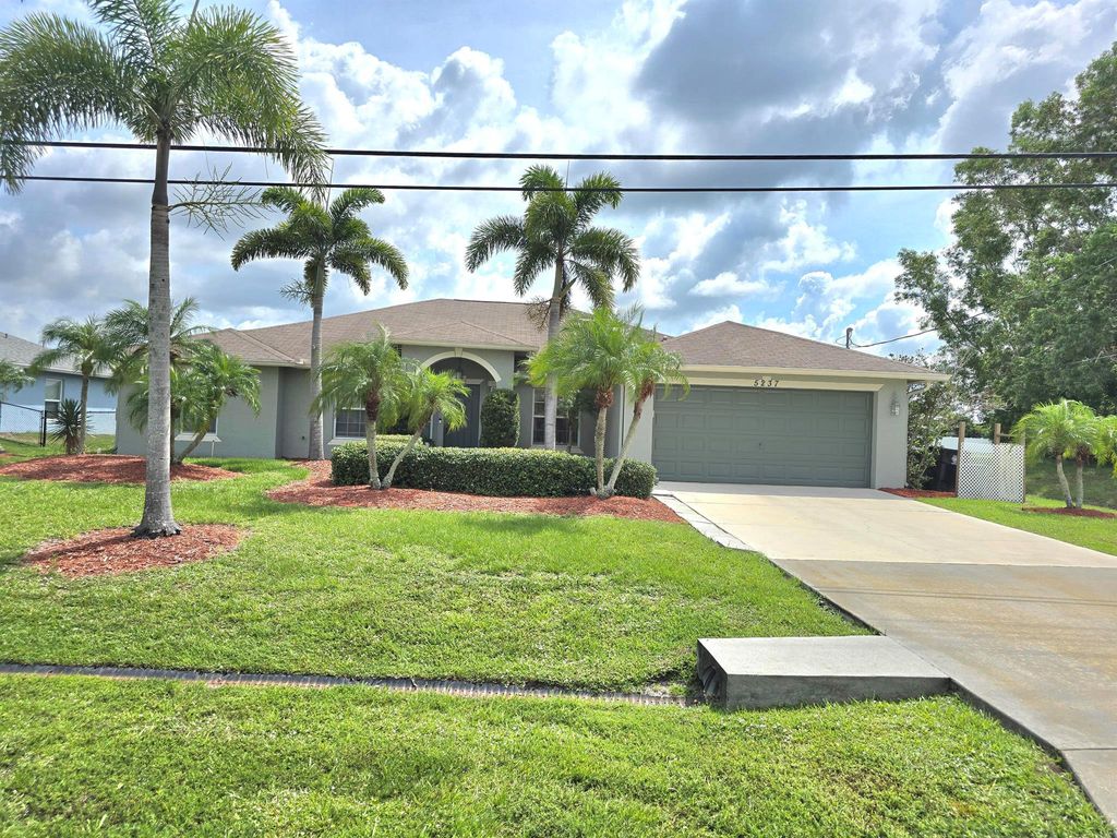 Photo of 5237 NW Milner Drive, Port Saint Lucie, FL 34983 (MLS # R11095774)