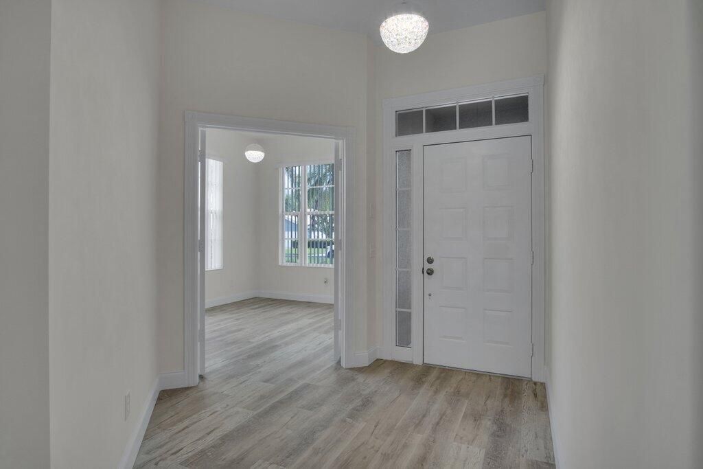 Photo of 324 NW Bentley Circle, Port Saint Lucie, FL 34986 (MLS # R11133807)