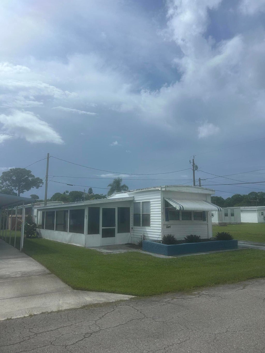 Photo of 5400 SE Jack Avenue #K3, Stuart, FL 34997 (MLS # B26075656)