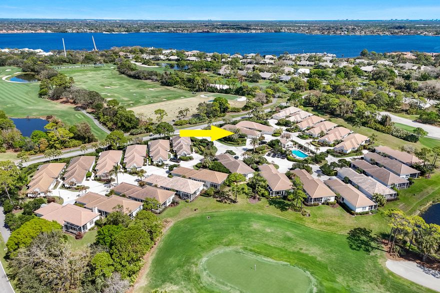 Mandatory $125,000 Membership Initiation Fee and Mandatory Annual Club Dues, HOA, POA, and Capital Contributions. Fairway Village is a charming and intimate enclave of just 27 single-family patio homes designed for comfort, privacy, and effortless living. Perfectly positioned on the largest lot in the village, this beautifully maintained one-story residence offers a rare blend of space, tranquility, and convenience. Spanning 1,946 A/C square feet, this 3-bedroom, 2.5-bath home features a highly desirable and expanded, split-bedroom floor plan, creating ideal separation between the primary suite and guest accommodations. The thoughtfully designed layout provides both functionality and privacy, making it perfect for everyday living as well as hosting family and friends.  The interior has been newly painted, creating a fresh and inviting atmosphere throughout the home. The updated bathrooms add a touch of modern comfort, while the motorized window treatments in the primary bedroom provide both convenience and a touch of luxury. Offered fully furnished, this home presents a truly turnkey opportunity for buyers seeking an easy transition into the Harbour Ridge lifestyle. Step outside and enjoy the peaceful setting of your beautifully landscaped privacy lot, offering a quiet retreat surrounded by mature greenery. The two-car garage provides ample storage and practicality with additional guest parking across the street. Residents of Fairway Village enjoy access to a community pool and outdoor kitchen, perfect for relaxing afternoons or casual gatherings with neighbors. Golf enthusiasts will especially appreciate the short walking distance to the community's golf practice facilities, making it easy to enjoy the game whenever inspiration strikes. Combining location, privacy, and turnkey convenience, this exceptional property represents a rare opportunity to own one of the most desirable homes in Fairway Village. Harbour Ridge is one of the most premier private club memberships in all of South Florida, which offers luxurious amenities for all of their members. Whether you enjoy golf, boating, kayaking, paddle boarding, fitness, tennis, pickleball, dining, bird watching, or embracing the natural surrounds of a Certified Audubon Cooperative Sanctuary, Harbour Ridge offers something for everyone. The club also prides themselves by providing their membership an unparalleled level of personalized service across all amenity venues to ensure the highest level of membership experiences throughout the club and community.