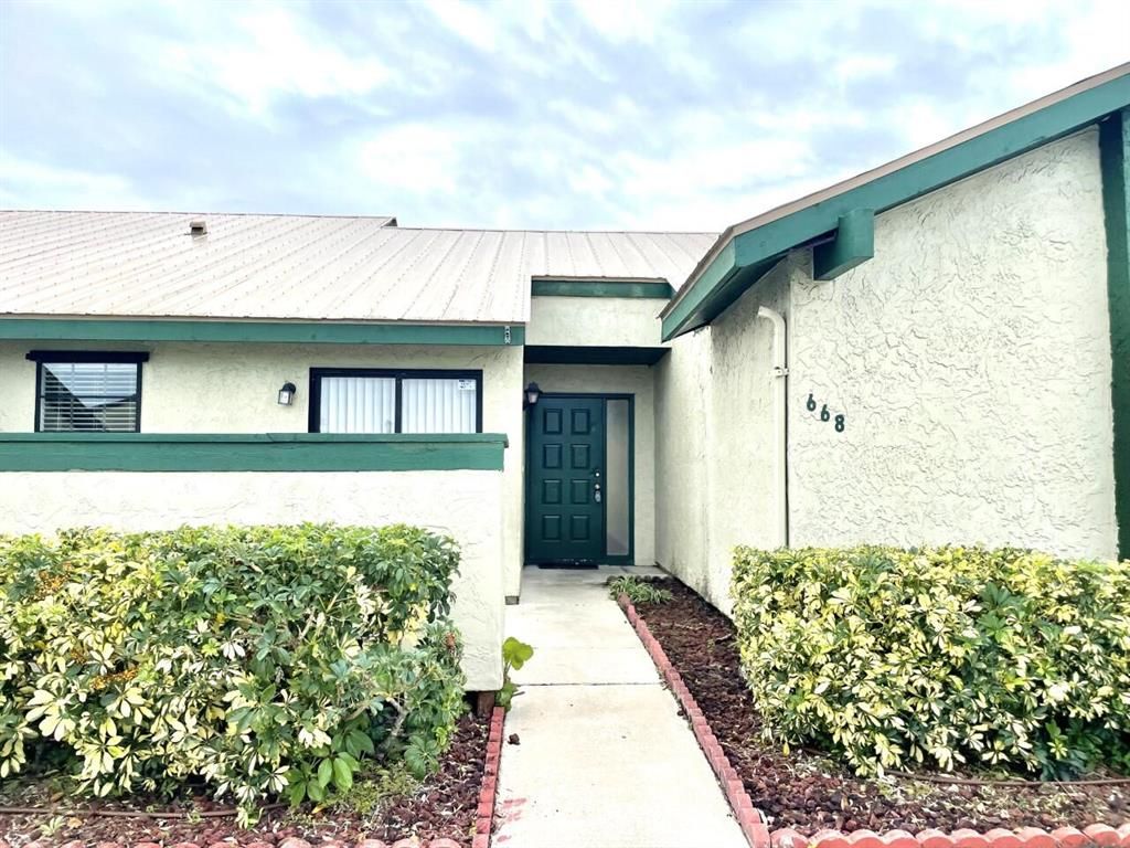 Photo of 668 SW Veronica Avenue #668, Port Saint Lucie, FL 34953 (MLS # R10861860)