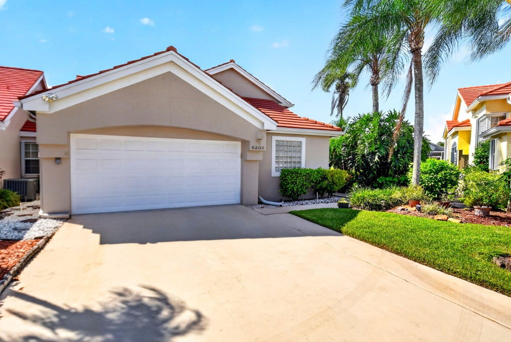 Photo of 6203 Bear Creek Court, Lake Worth, FL 33467 (MLS # B26065027)